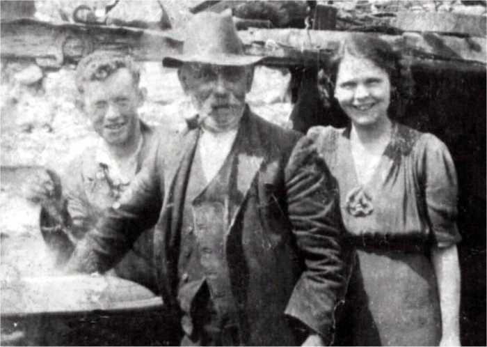 Granda Boyle with Peter and Florrie, at the potato boiler, about 1940